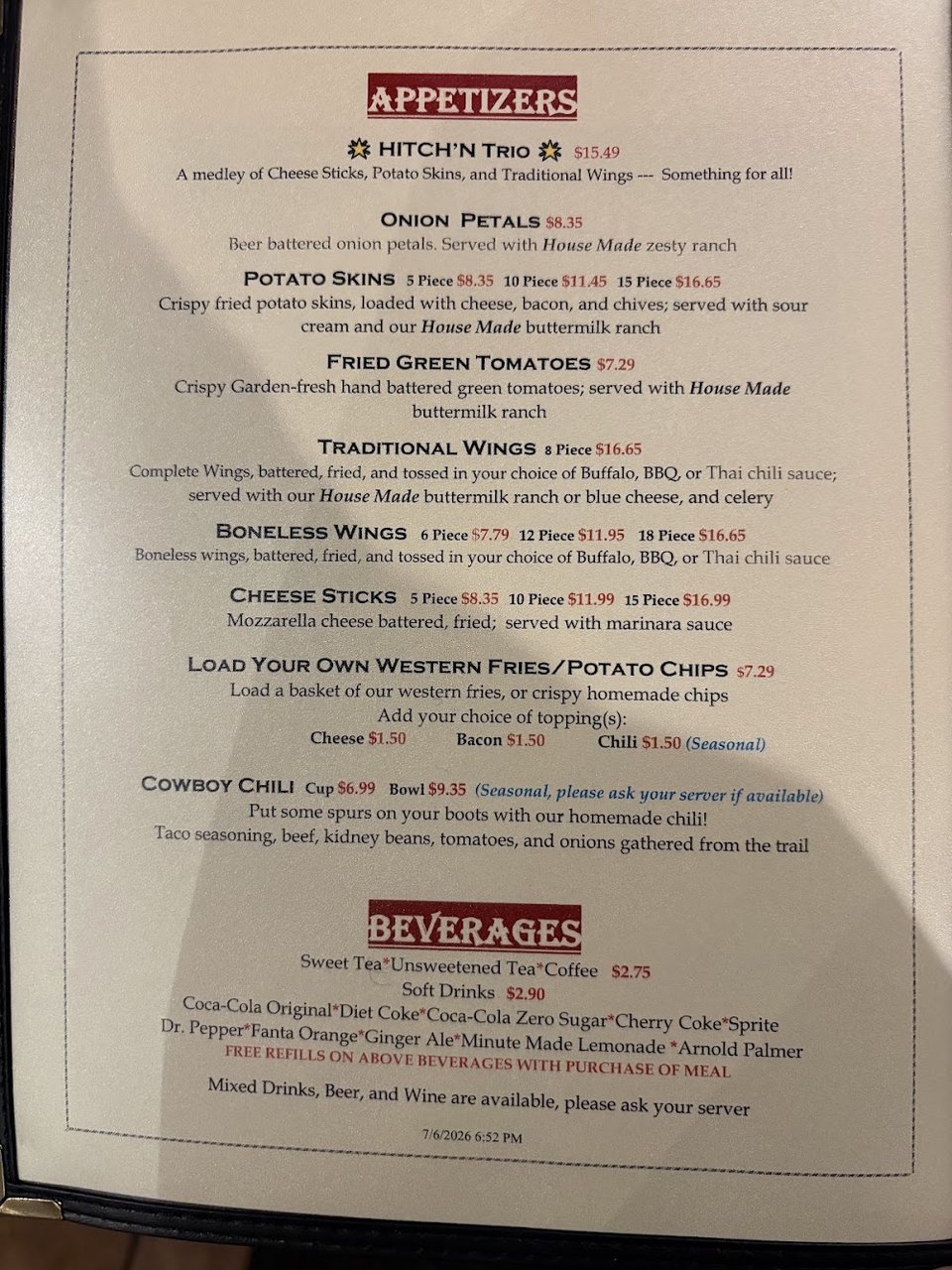 Printed menu with comfort food and drinks.